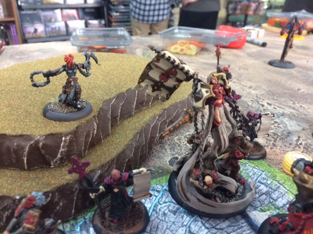 1 Protectorate of Menoth Harbinger vs Retribution of Scyrah